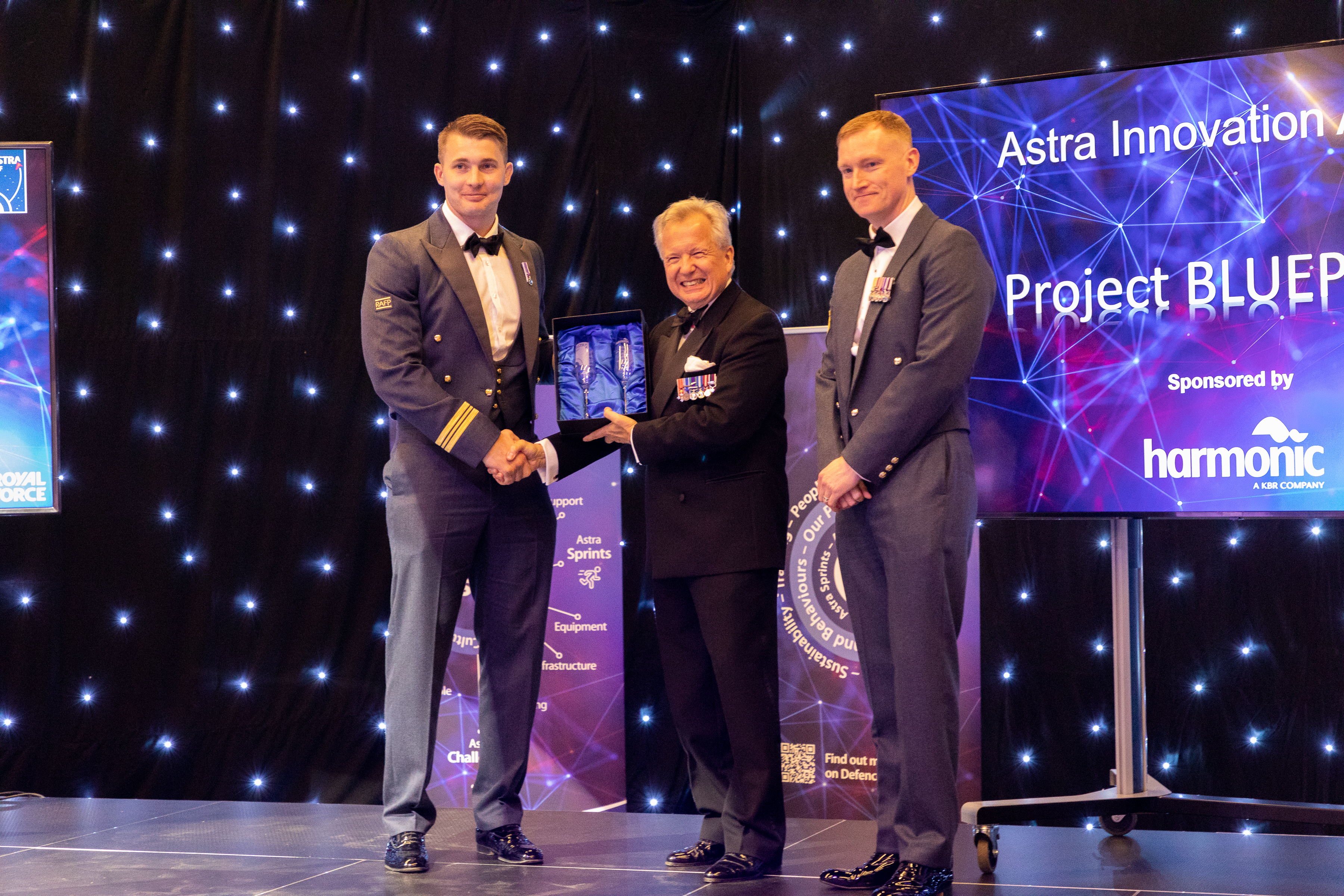 Squadron Leader John Barrowcliff and Fligth Sergeant Si Ball being presented with the Astra Innovation Award